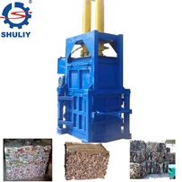 Vertikálny hydraulický baliaci stroj